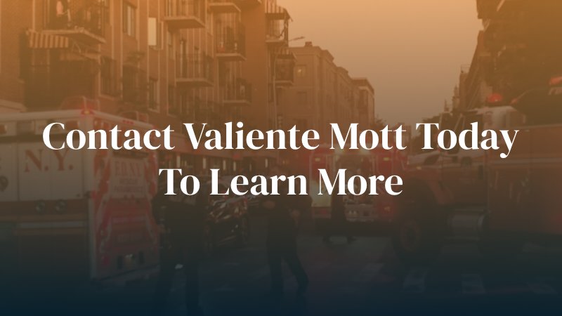 ambulance on accident scene with text caption: "contact Valiente Mott today to learn more"